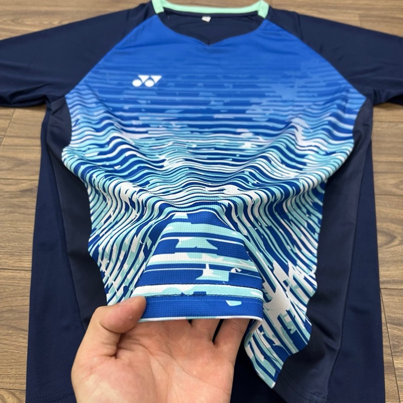 Chi tiết vải áo Yonex thanh lý - họa tiết sóng xanh