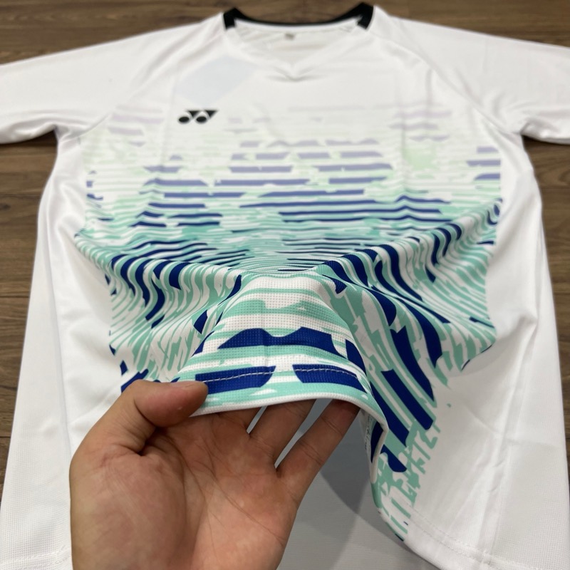 Chi tiết vải áo Yonex thanh lý - trắng họa tiết xanh